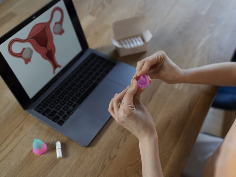 high-angle-hands-folding-menstrual-cup